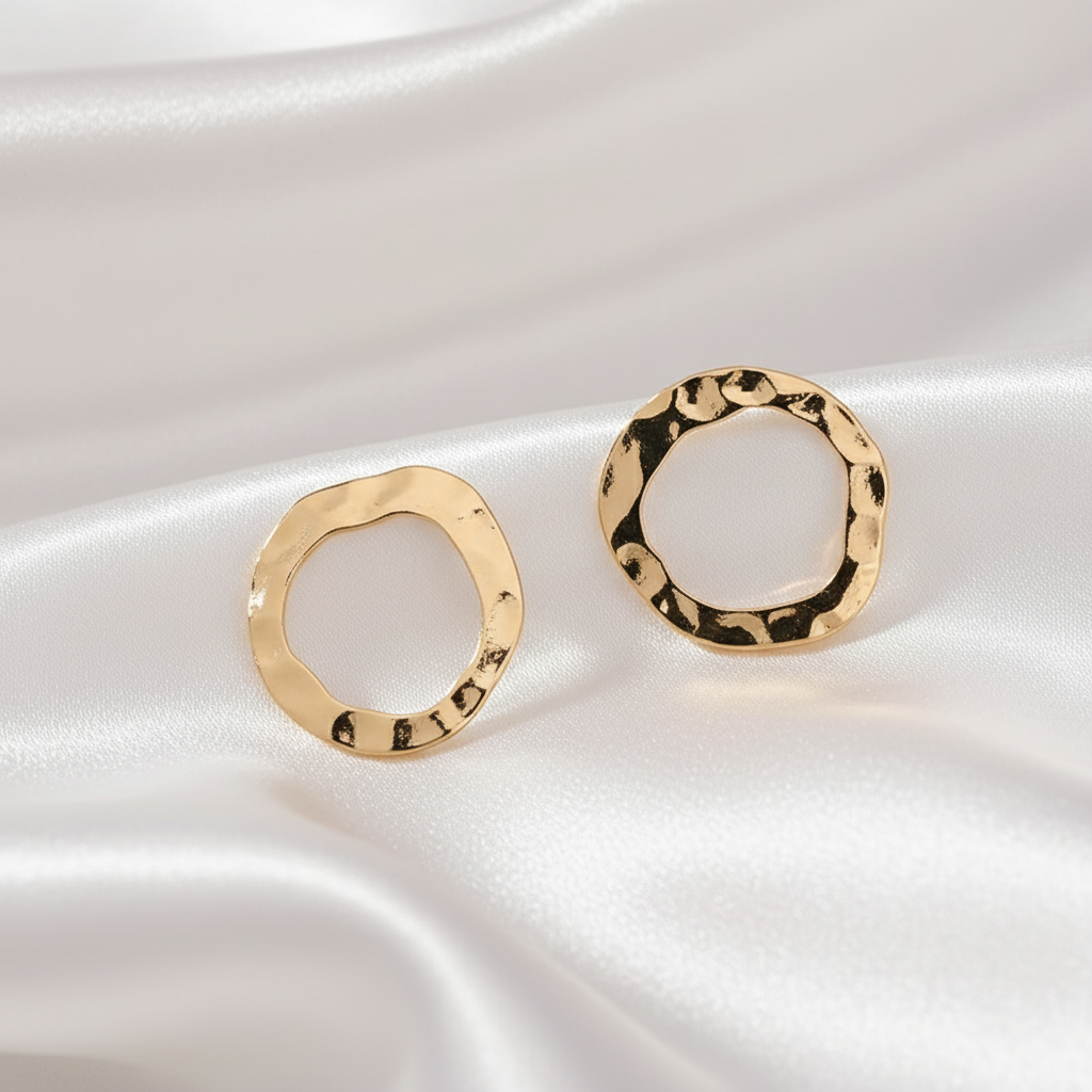 Ronde Golfvormige Oorbellen - Goud